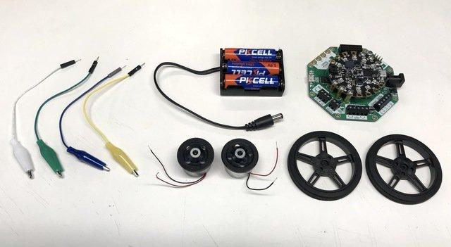 Attach Motors & CRICKIT The servo wheel centers itself conveniently on top of the CD/DVD motor.