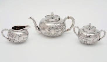 250-300 115 A Chinese export three piece silver tea set of globular form, decorated with birds and