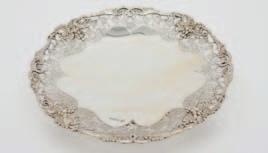 16 A George V silver presentation salver, maker The Goldsmiths and Silversmiths Co Ltd, London, 1939, of circular form, with pie crust border, on four pad feet, 36cm diameter, 41.5ozs.