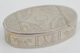 40 44, 45 40 A George III silver oval snuff box, maker Samuel Pemberton, Birmingham, 1794, the hinged lid engraved with central cartouche and floral sprays, with similar decorated sides, with gilded