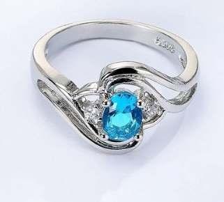 Blue Topaz & Diamond CZ Ring
