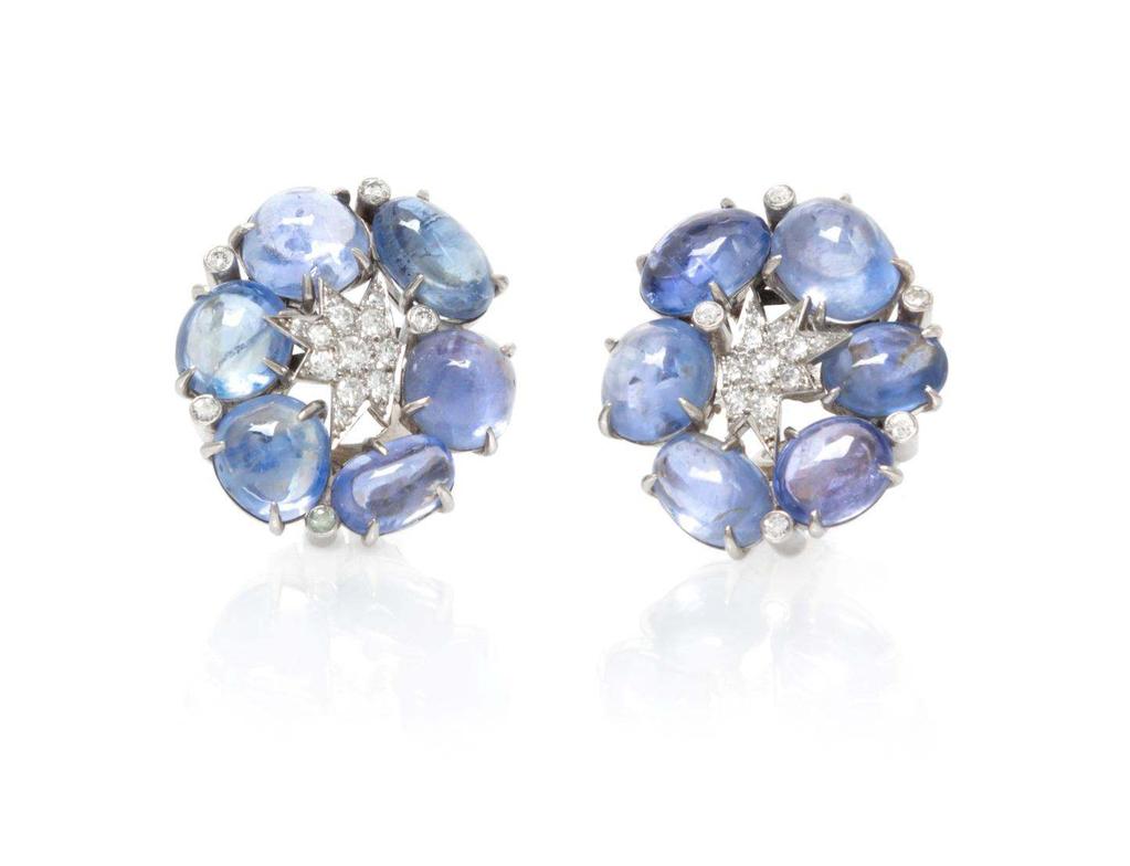 Sale 394 Lot 120 A Pair of Platinum, Diamond and Sapphire Star Earclips, Verdura, Circa 1945, consisting of central star motif plaques and scattered bezel settings containing 30 round brilliant cut