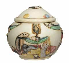 Every piece is hand-tinted, lending each cachepot its distinctive character. Cirque du Furet Lidded cachepot, featuring over a dozen playful ferrets doing what they do best performing!