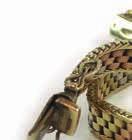 698 A 9ct yellow gold gatelink bracelet with heart shaped padlock clasp, 8.2 gms 70-90 Lot 699 699 A 9ct tri-colour gold brick-link bracelet, 13.