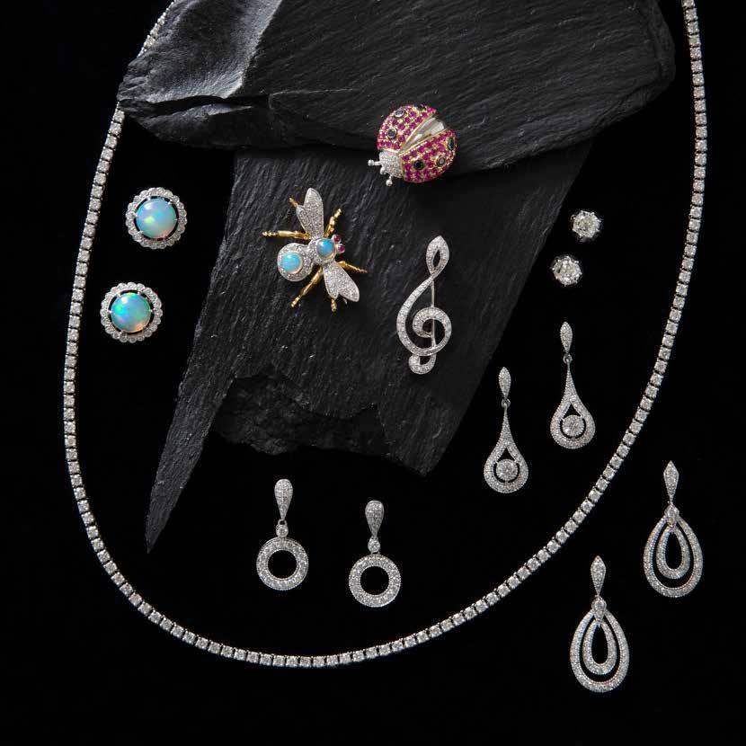 Ruby & diamond ladybird brooch Opal & diamond cluster Opal & diamond bee brooch Diamond treble clef brooch