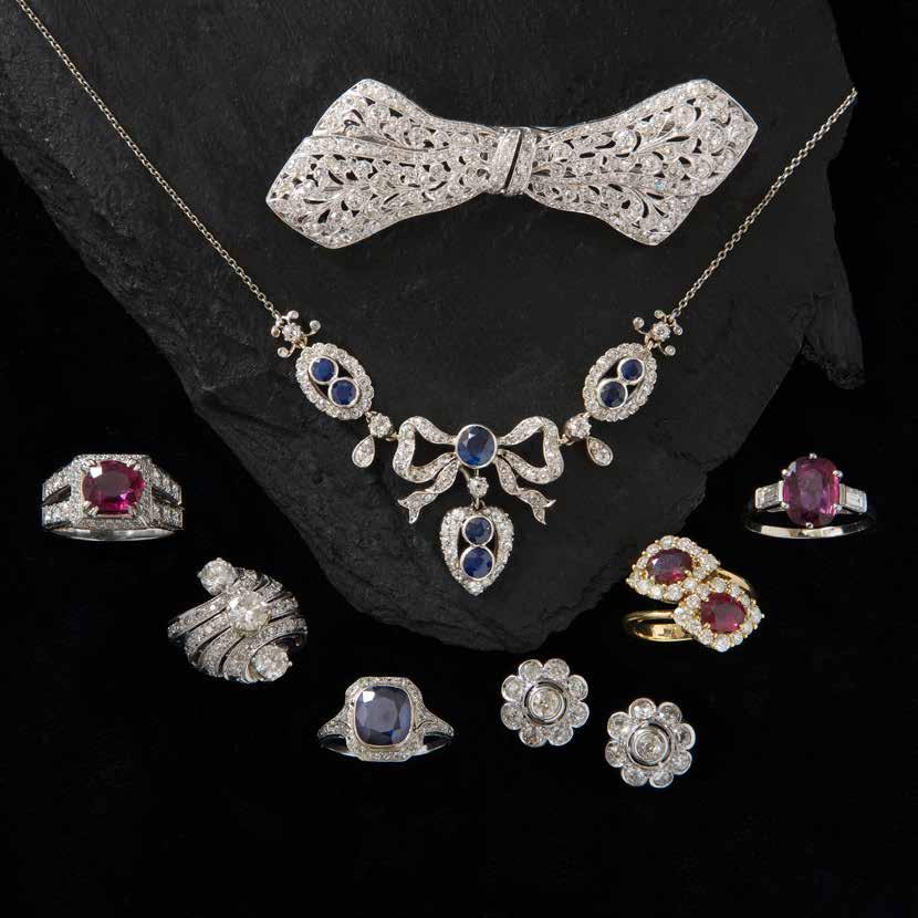 Diamond bow double clip brooch circa 1925 Sapphire & diamond necklace circa 1920 Ruby ring with diamond shoulders estimated ruby weight = 2.