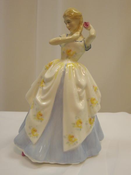 6. Royal Doulton Figurine