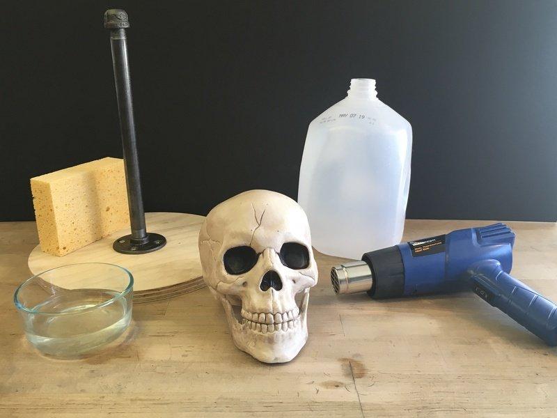 Materials & Tools In addition to the above parts, you'll also need these materials and tools: Decorative skull made of thick plastic (too thin and it won't resist the heat, and thus melt) One gallon