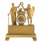 1348 French Empire gilt bronze figural mantel clock first quarter, 19th century; figures of Cupid and Psyche flanking shaped clock case, topping rectangular base having relief decoration of Cupid and