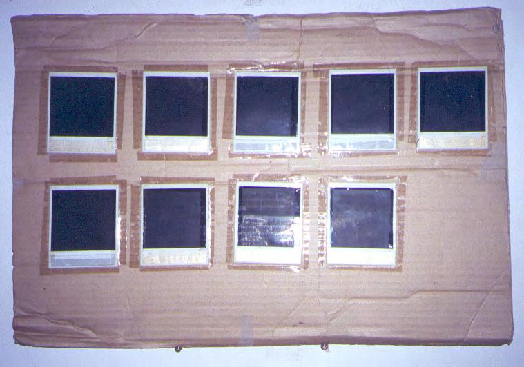Untitled, 1990 wood, polaroids, tape