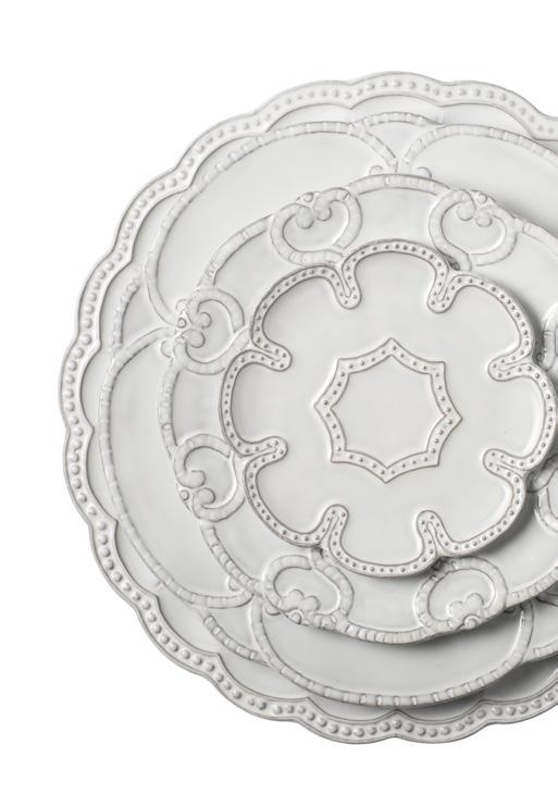 WHITE PETALS Material: Stoneware Colours: White Features: Classic stoneware dinnerware, scalloped and beaded profiles handmade