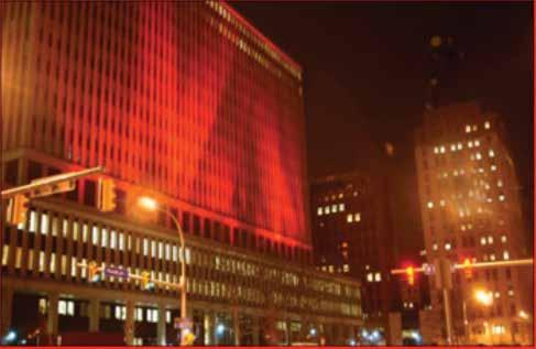 EXTERIOR OF BUILDING Use red lighting outside your building. Use a red dress logo on the side of the building. use red holiday lights or rope lighting on trees, bushes, poles and around your building.