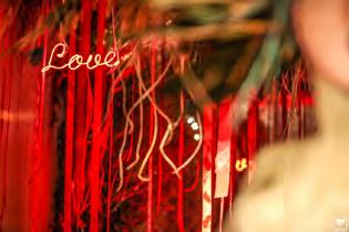hearts, and love neon signs, while the main