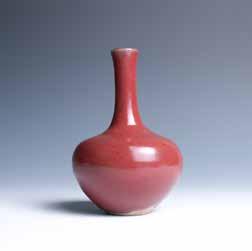 5 cm $500-800 10 A RED GLAZED VASE 红釉赏瓶 A red-glazed vase, of compressed globular body