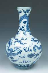 H:58cm $700-1200 162 A BLUE AND WHITE VASE 青花龙纹天球瓶 大清同治年制 款 The blue and white vase, of globular body rising to a long waisted neck with an