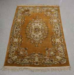 195 A LARGE TURCO PERSIAN RUG 地毯 A large Turco Persian rug, of rectangular section, decorated with European