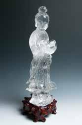 27 A CRYSTAL GUANYIN,QING 清水晶观音立像 A crystal Guanyin, the whole body of transparent stone, with some small