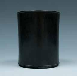 37 A WOODEN BRUSH POT 十八 / 十九世纪紫檀笔筒 The brush pot of cylindrical form, supported on three feet, the wooden brush of