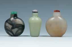 5cm, 10cm 53 A SET OF THREE SNUFF BOTTLES 鼻烟壶一套三件 A set of three snuff bottle, one of circular form with the red translucent body, one of