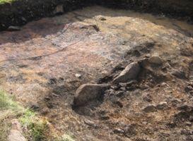 THE BRONZE AGE HEARTH AND PAVEMENT AT KINGSDALE HEAD.