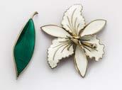 227. A David Andersen silver and enamel leaf brooch, (af) together with a Norwegian silver and enamel orchid brooch in white 50-80 231.
