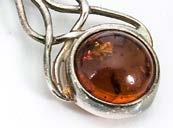 251. A small collection of amber and garnet set jewellery, including an amber