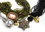 A large quantity of costume jewellery, including a pair of paste set cuff earrings, various beads