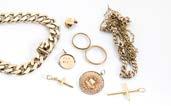 A collection of silver jewels, including a curb link necklace, three silver lockets, silver watch chain, anchor
