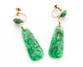 357. A pair of late 19th Century Chinese jade and gold panel drop earrings, carved with gourd and leaf