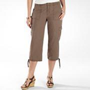 Capri pants, pants that expose the calf, are not appropriate