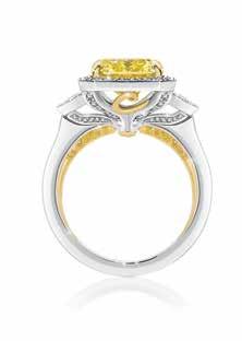 51ct Fancy Intense Yellow Emerald Cut Diamond and surrounded by a dazzling border of