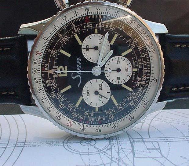 7 of 12 5/20/2008 10:53 AM Dial and hands: The dial is what this watch is all about. Like mentioned before this is a Breitling Navitimer style watch, featuring the slide rule bezel.