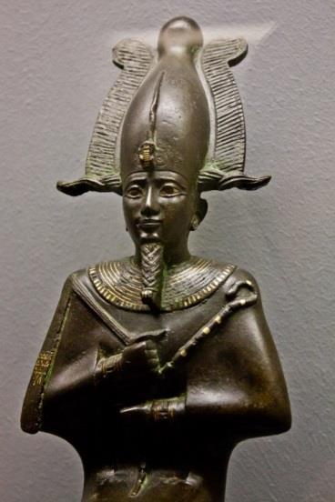 horn. It is uncertain whether the statue was that of a god or a king, as both were represented as wearing similar crowns during the New Kingdom (1570-1085 BCE).