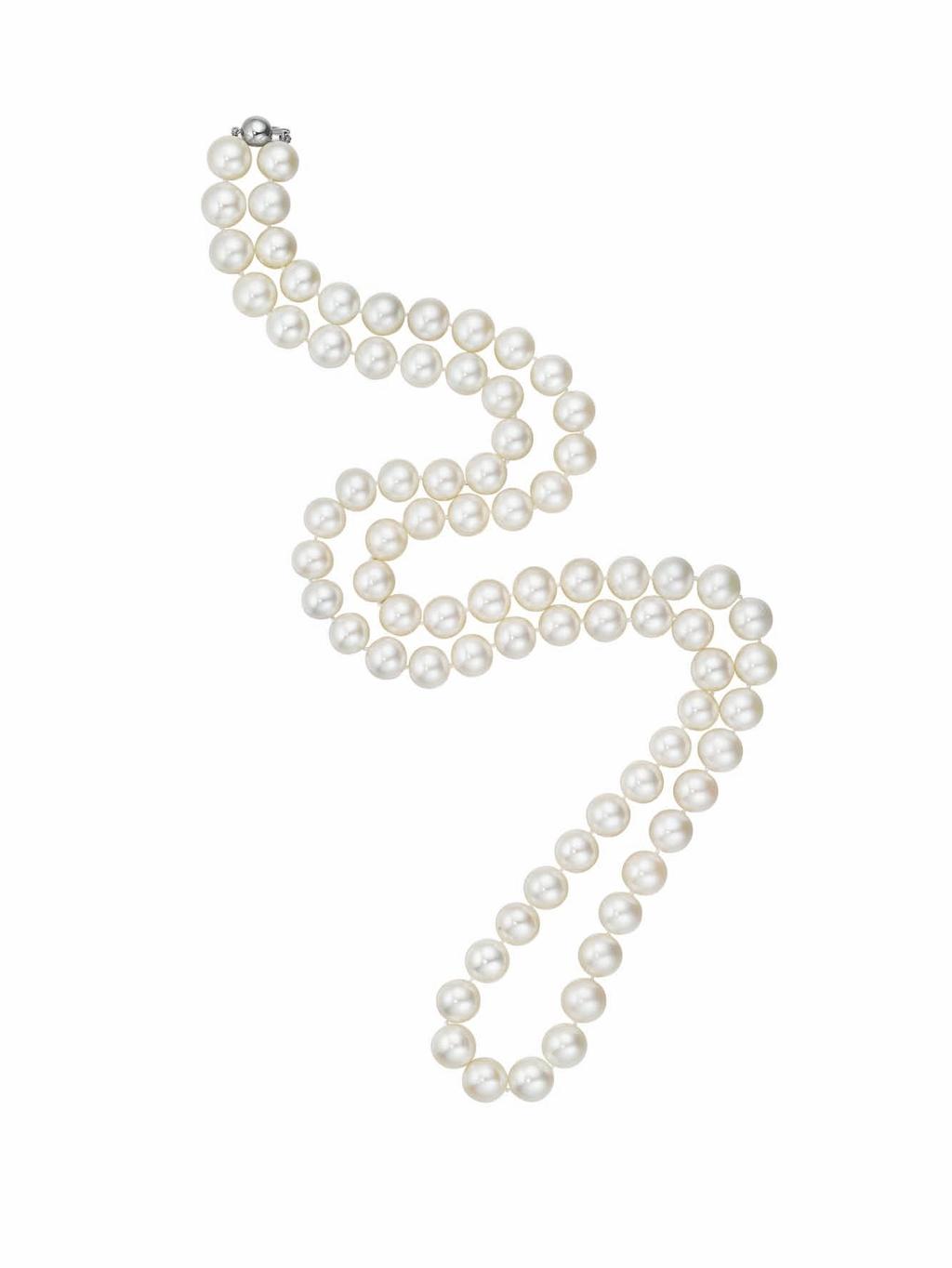 18 19 19 18 A Cultured Pearl Necklace Of seventy-seven white cultured pearls, measuring from approximately 11.50 to 10.37 mm, joined by a polished 18K white gold sphere clasp, length 35 inches.