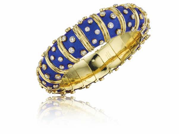 Signed Tiffany & Co. Schlumberger 750 France Estimate $30,000-40,000 76 An Unheated Ceylon Sapphire and Diamond Ring Set with an oval-cut sapphire, weighing approximately 4.