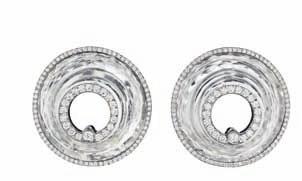 Estimate $2,500-3,500 160 A Pair of Rock Crystal and Diamond Earclips ALETTO BROTHERS Each designed as a polished white gold disc, set with a faceted rock crystal ring, enhanced by circular-cut