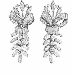 192 193 194 PROPERTY OF A LADY 192 A Pair of Diamond Ear Pendants Each designed as a circular-cut and marquise-cut foliate spray, accented by a baguette-cut diamond scrolling bow, mounted in 18K