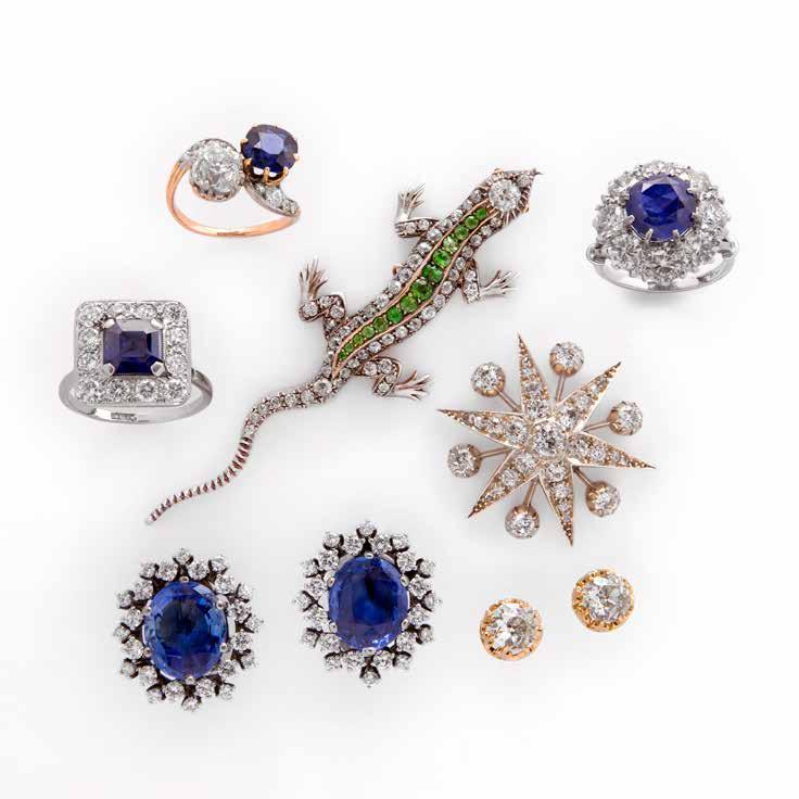 Sapphire & diamond cross over ring circa 1900 Victorian lizard brooch set with demantoid garnets & diamonds circa 1880 Sapphire & diamond cluster ring sapphire certificated 5.