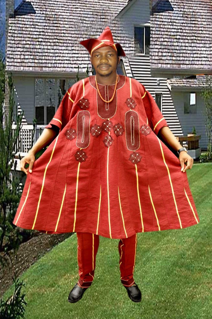 Fig. 6: A Yoruba man clad in traditional attire of aso oke- woven fabric locally made.