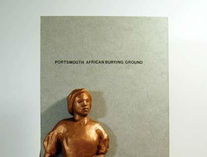 The male figure alludes to the first enslaved African recorded in Portsmouth - as the text