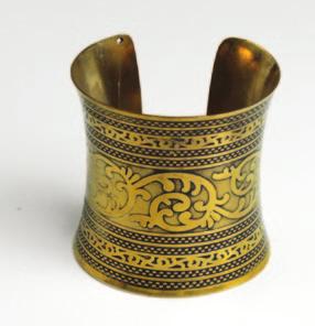 7 Royalty Cuff: Gold Bring royalty to your look with this gold colored Royalty Cuff.