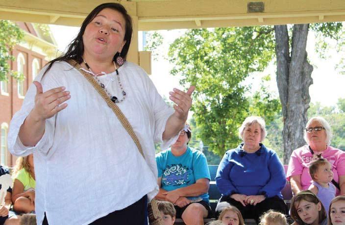 6 NATIVE OKLAHOMA JULY 2018 Cherokee Stories on the Square continues through July Storyteller Janelle Adair entertains visitors with traditional stories under the gazebo at Cherokee Square.