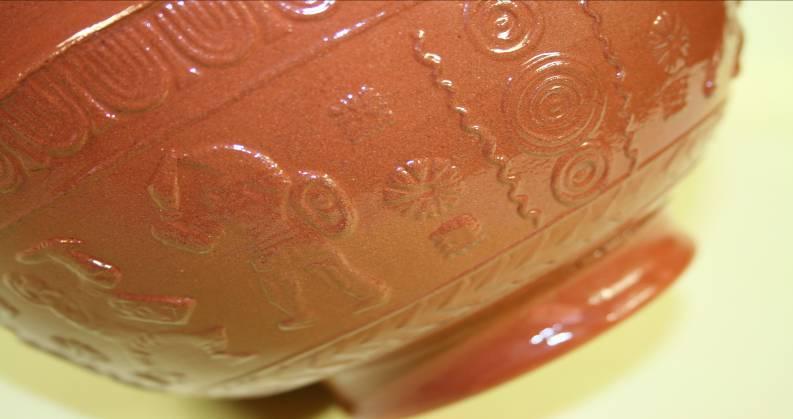 Roman Romano British Pottery Samian Ware Samian ware is the term applied to a red, glossy pottery produced in Gaul and Germany and imported into Britain during the first to third centuries AD.