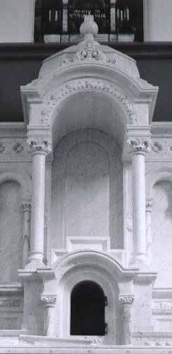 carved carrara marble altar.