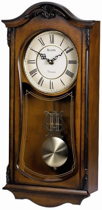 C3542 CRANBROOK. Solid wood and wood veneer case, Old World walnut finish. Decorative carved accents.