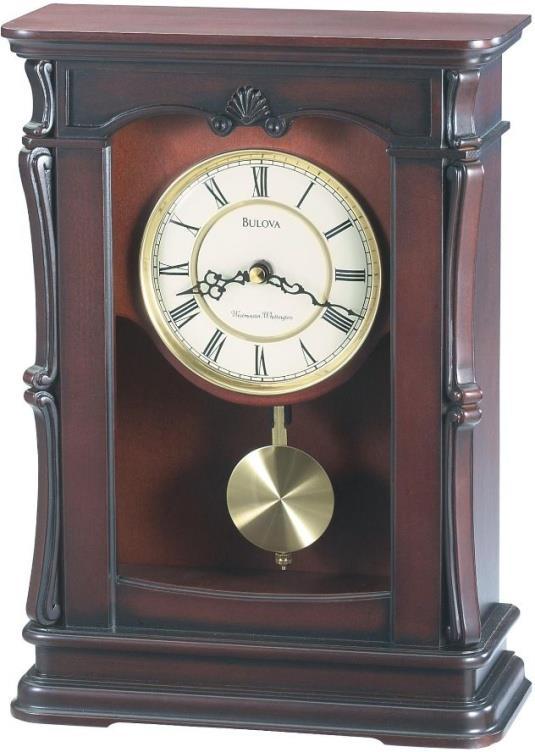 B7653 ALLERTON. Solid wood case, Old World walnut finish. Angled comers with fluted pilasters and decorative carved accents.