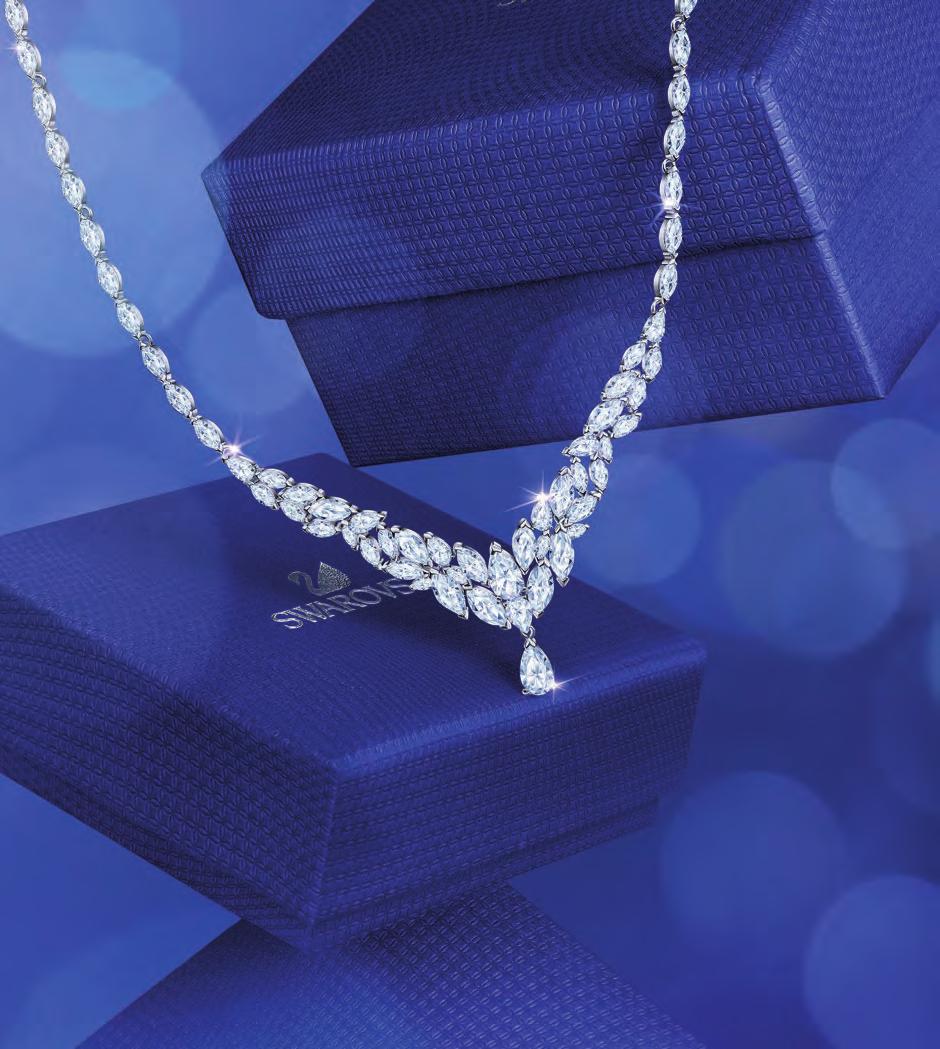 CAPTIVATE with CRYSTALS Capture the brilliance of the season with elegant Swarovski crystals that reflect every bit of the holiday spirit. THIS PAGE Louison, Necklace, 5419234, $399.