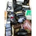 112. Box of cameras and lenses and camera accessories 120.