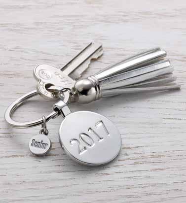 Honor someone who was there for you with this platinum mini tassel key ring.