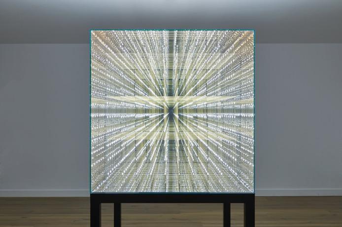 INFINITE CUBE (2018) Infinite Cube is a one metre cubed construction of one-way mirror glass and 1,000 LED lights that creates multiple planes of infinitely receding points of light.